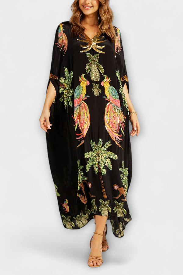 Linda - Vestido llamativo con hombros asimétricos y estampado de palmera