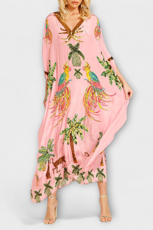 Linda - Vestido llamativo con hombros asimétricos y estampado de palmera