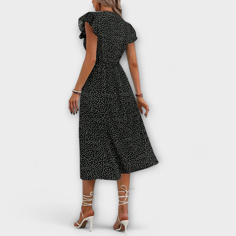 Elegante vestido midi con lunares