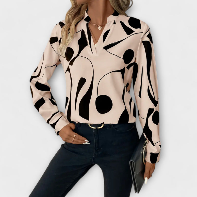 Blusa elegante de manga larga con escote en V