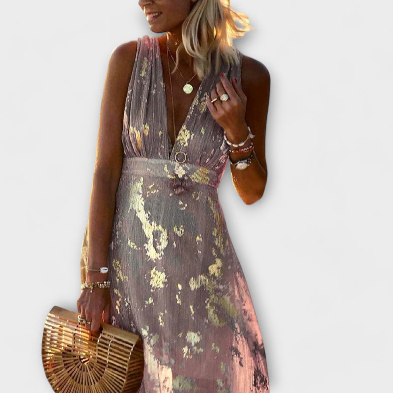 Vestido fluido con escote en V y detalles de lentejuelas