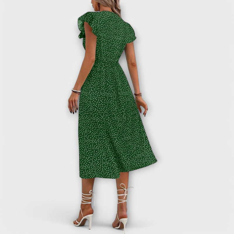 Elegante vestido midi con lunares