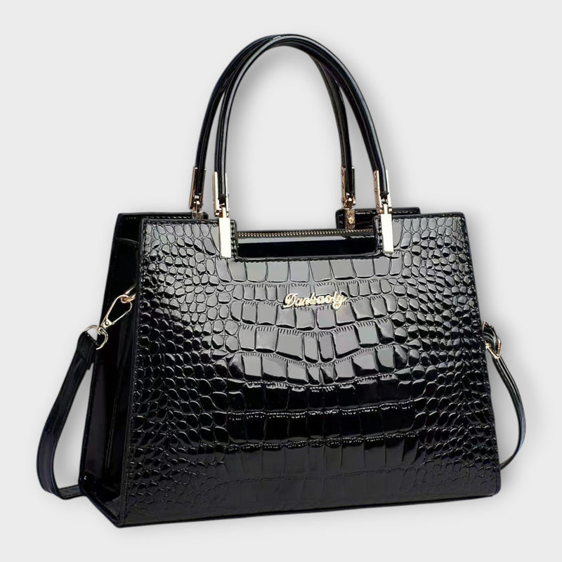 Bolso de mano con estampado de cocodrilo brillante
