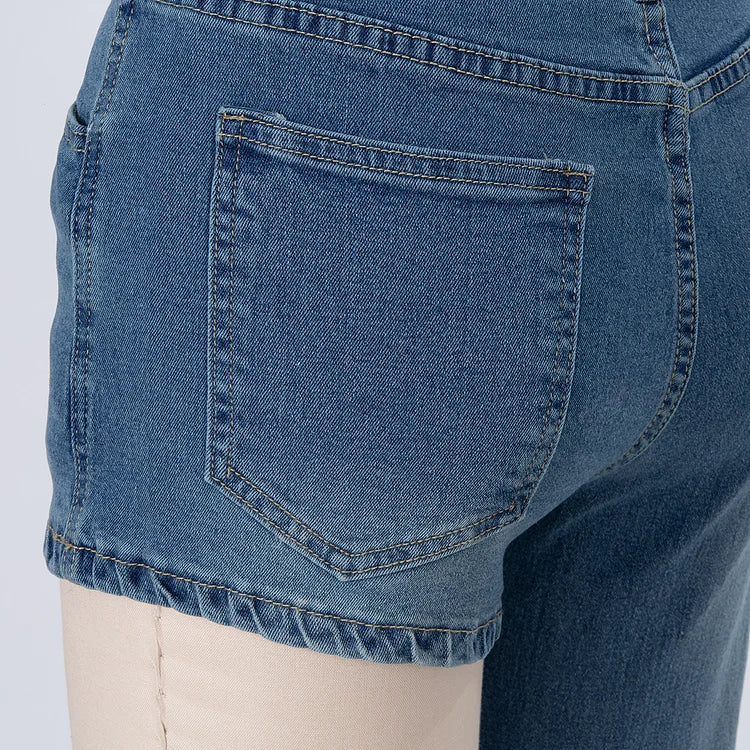 Astra - Pantalones cortos de denim asimétricos y a la moda con un tirante