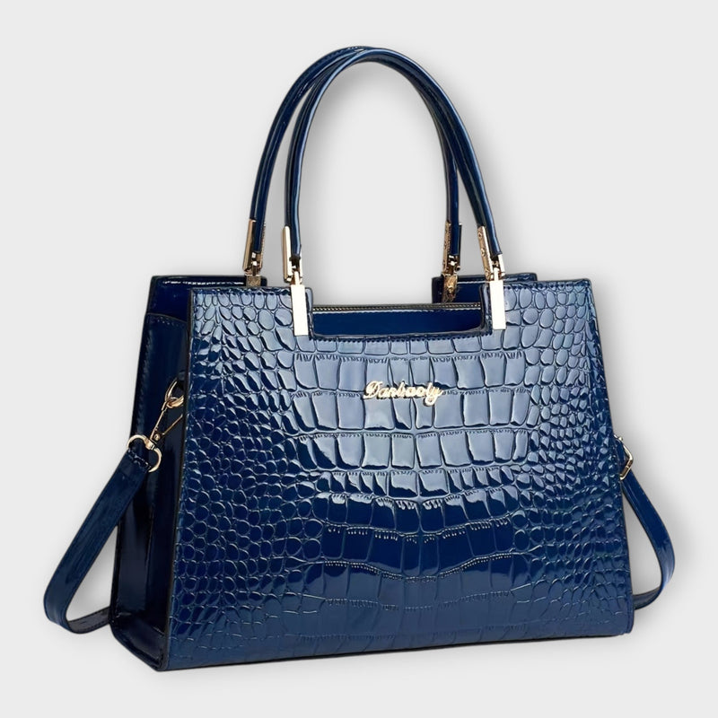 Bolso de mano con estampado de cocodrilo brillante