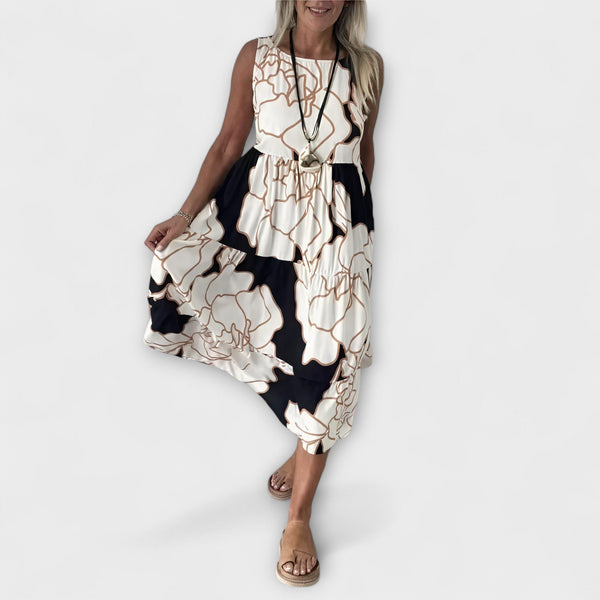 Vestido midi floreado con falda de volantes