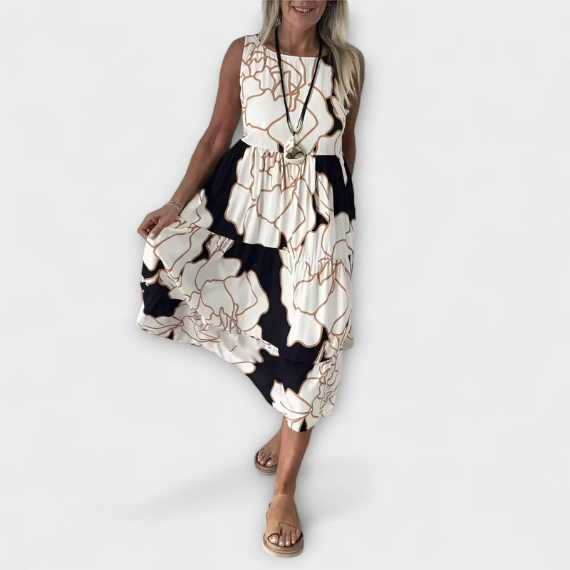Vestido midi floreado con falda de volantes