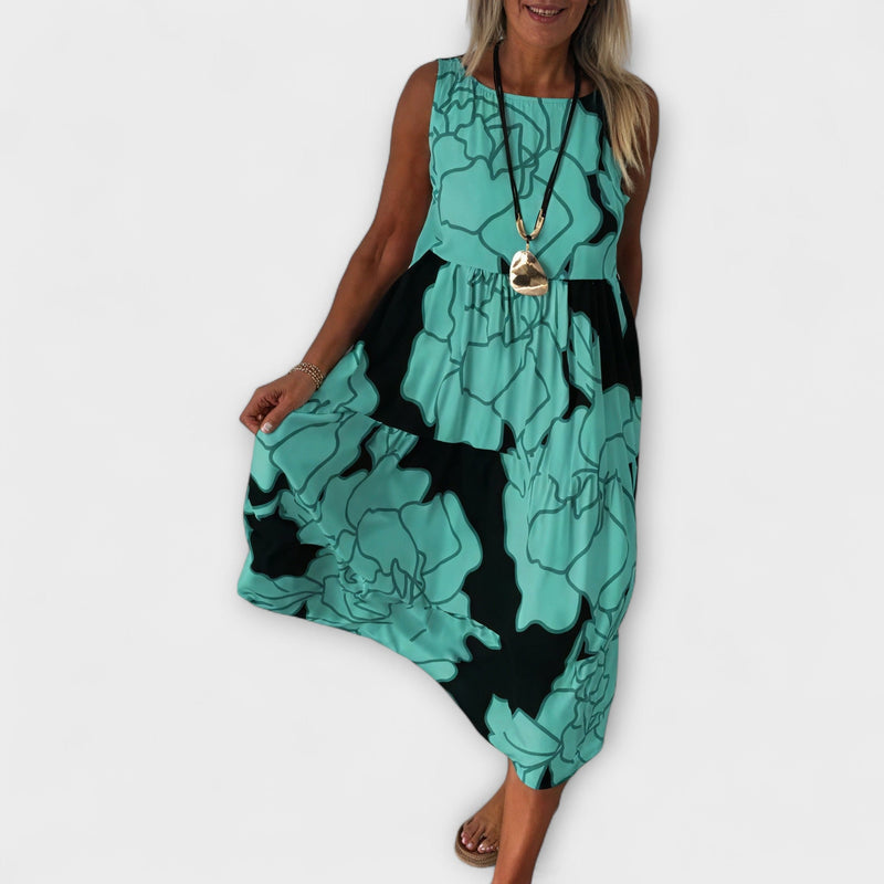 Vestido midi floreado con falda de volantes
