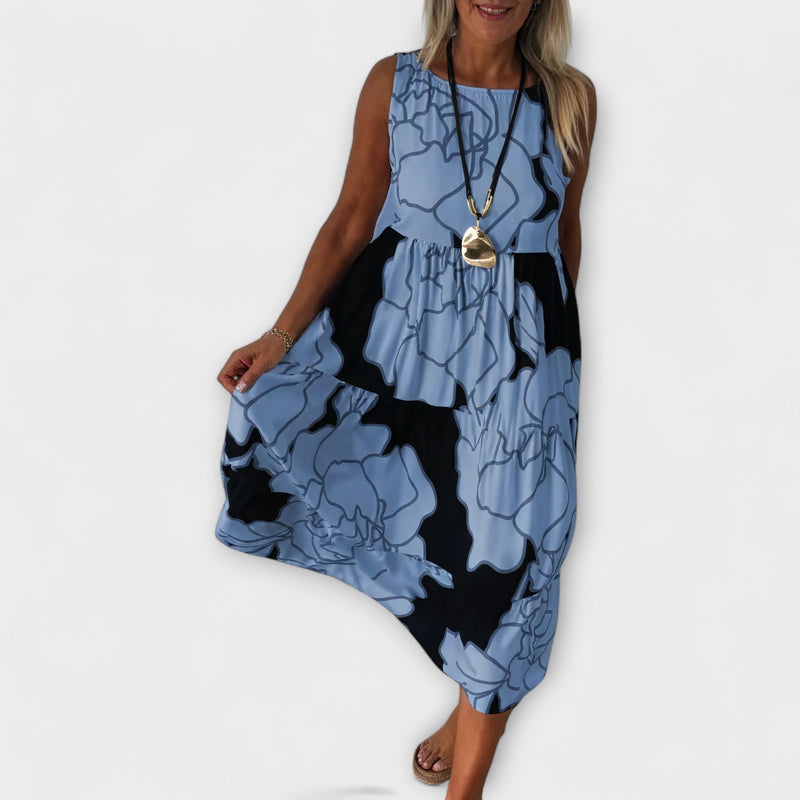 Vestido midi floreado con falda de volantes