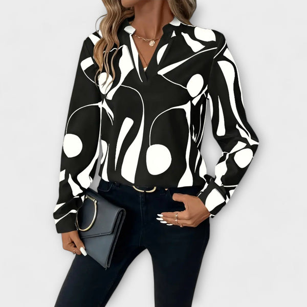 Blusa elegante de manga larga con escote en V
