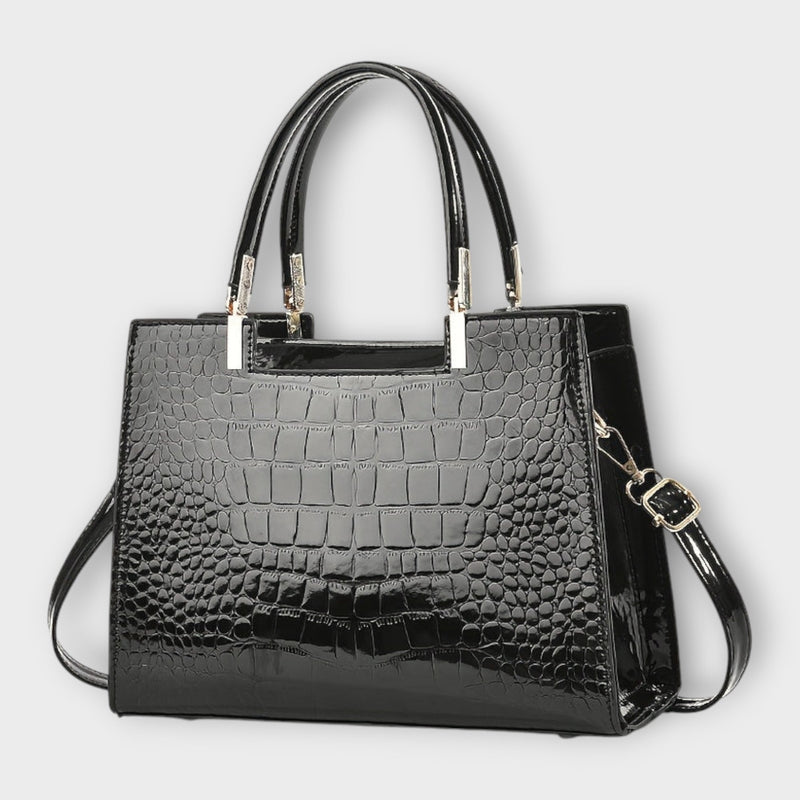 Bolso de mano con estampado de cocodrilo brillante