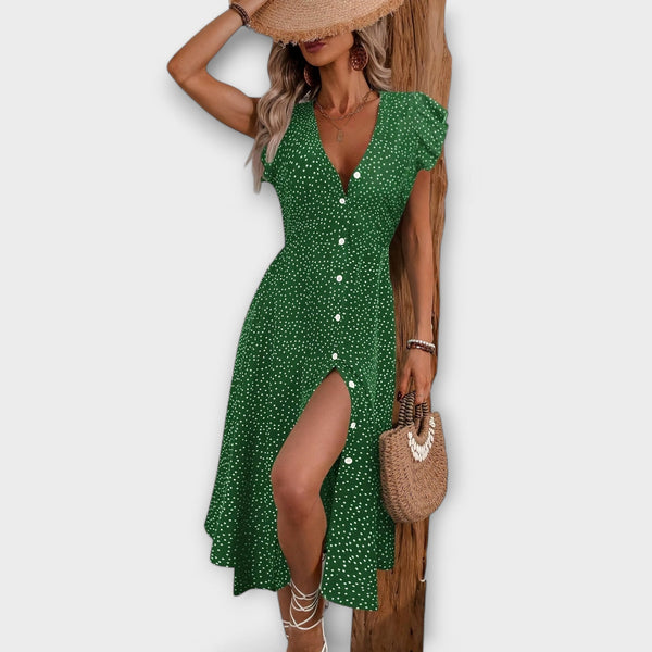 Elegante vestido midi con lunares