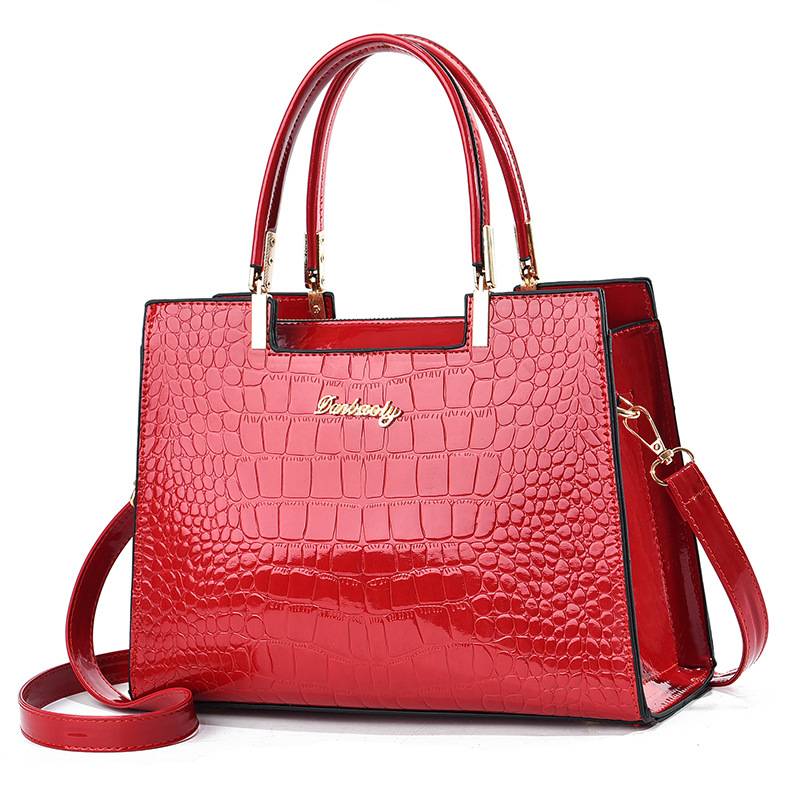 Bolso de mano con estampado de cocodrilo brillante