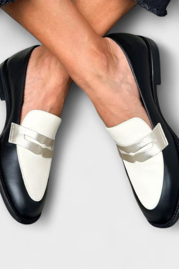 Xara – Mocasines negros con brillo metálico