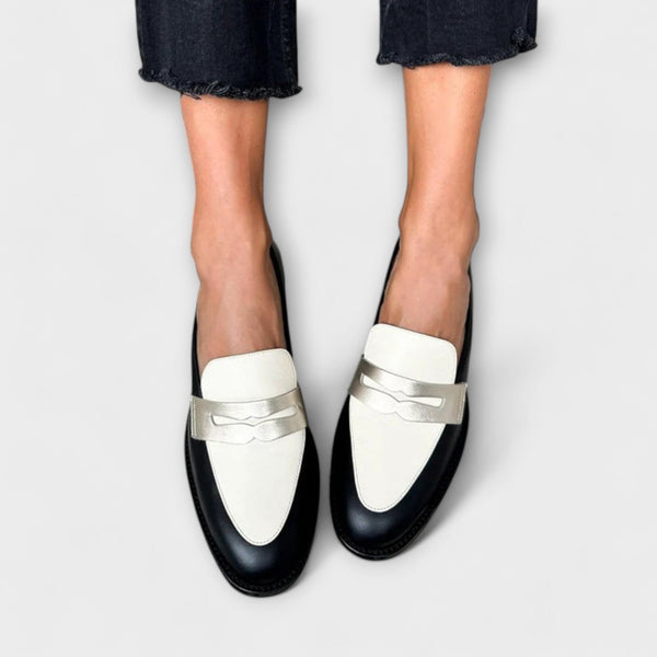Xara – Mocasines negros con brillo metálico