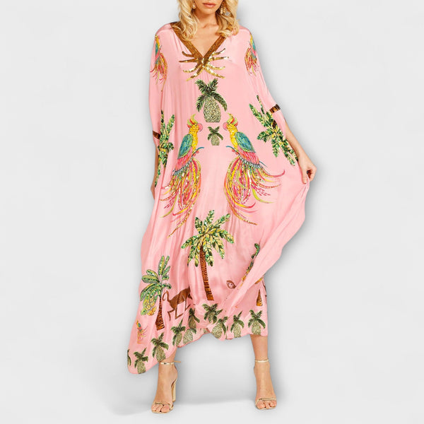 Linda - Vestido llamativo con hombros asimétricos y estampado de palmera