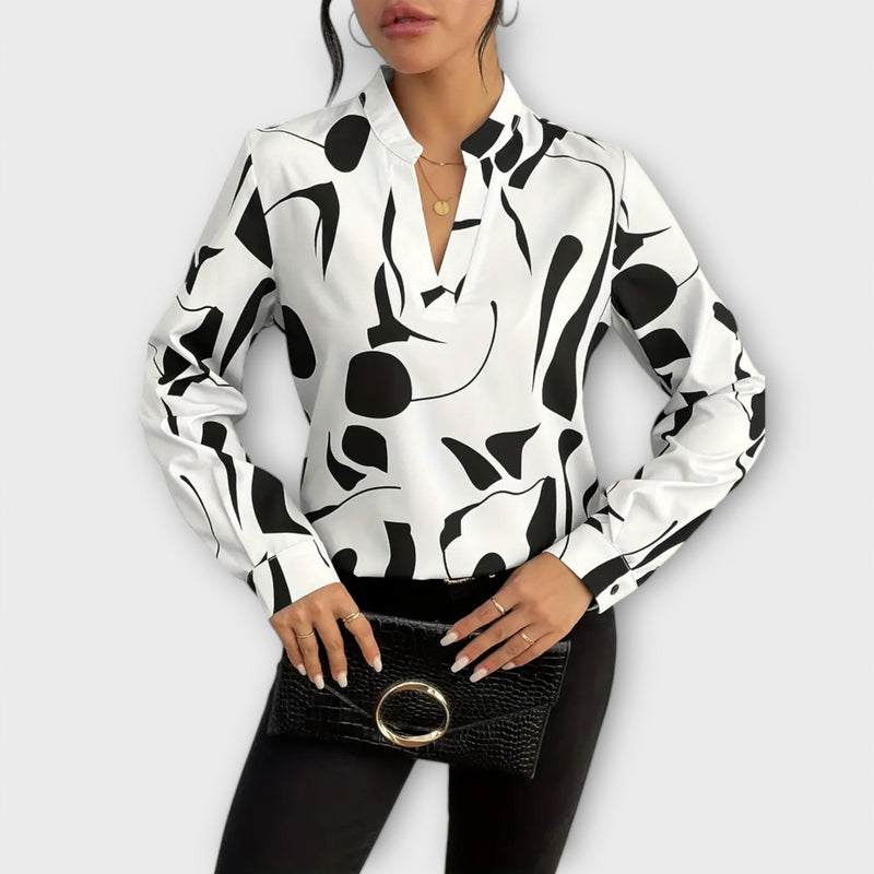 Blusa elegante de manga larga con escote en V