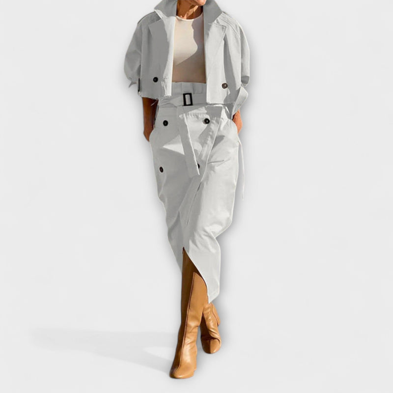 Lyra - Elegante chaqueta midi con falda y bolsillos
